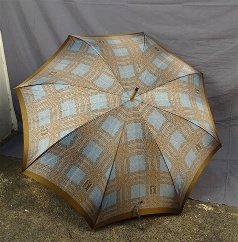 Parapluie YVES SAINT LAURENT .